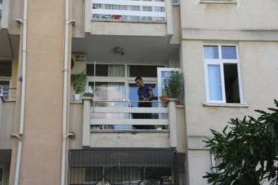 Oğlu yemeği beğenmeyince  kendini balkondan aşağı attı