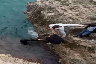 Falezlerden atlayan genç kadını imece usulü kurtardılar  