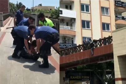 Üst geçitten atlamaya kalkan genç, polislere zor anlar yaşattı