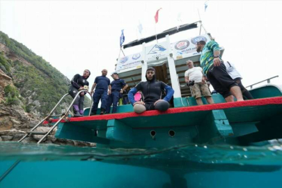 Depremde dizlerinden aşağısını kaybeden genç, aylar sonra dalış yaptı