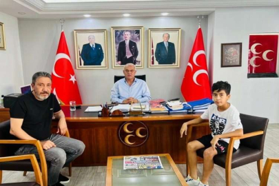 Menderes Kutlu, oğlu Murat Gürbüz ile birlikte MHP İl Başkanı Yusuf Kanlı’yı ziyaret etti