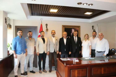 MHP heyetinden Tevke’ye “Hayırlı olsun” ziyareti