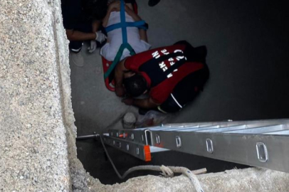 Tarsus’ta sulama kanalına düşen inek itfaiye ekipleri tarafından kurtarıldı