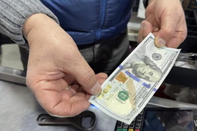 Sahte dolarla market vurgunu!