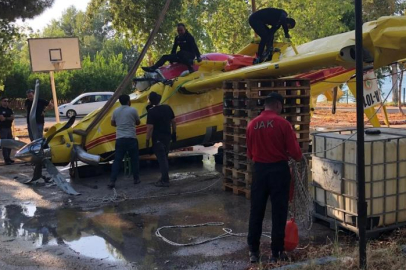 Adana'da baraj gölüne düşen yangın uçağının enkazı çıkartıldı