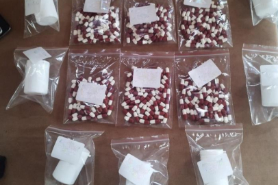 Cips paketinden uyuşturucu çıktı, silahlar ele geçirildi