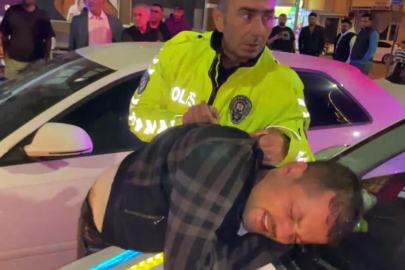 Alkollü sürücü ve yakınları polise yumrukla saldırdı
