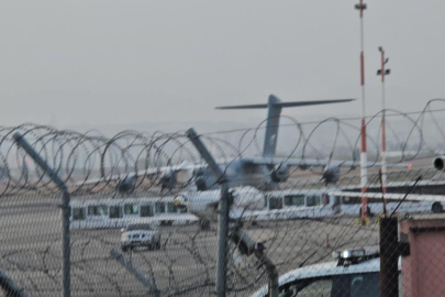 Gürcistan'da şehit düşen 20 askerin naaşlarını taşıyan uçak Türkiye'ye hareket etti