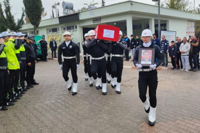 Lösemiye yenik düşen genç polisi 8 aylık kızı üzerinde 'polis' yazan beresiyle uğurladı