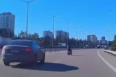 Adana'da otoyola giren bisikletli ölümden döndü