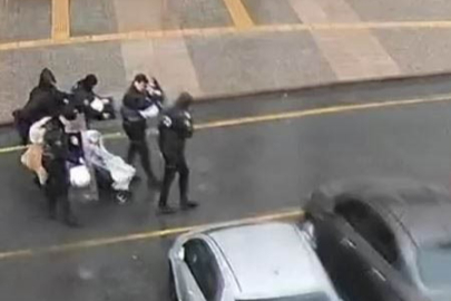 İstanbul’da fırtınada anne ve bebeğe polis kalkanı