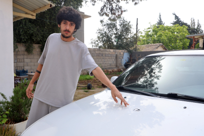 Sesi duyunca cam patladı sandı, kaputta mermi buldu! Hatay'da korkutan olay