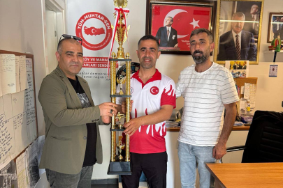 Anahtar Parti Yüreğir İlçe Teşkilatı’ndan dünya şampiyonu muhtara ziyaret